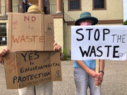 Two Annapolis County residents were waiting outside of the courthouse in Annapolis Royal on July 22 to express their opposition regarding the development and operation of a County of Annapolis waste transfer station along Highway 201 in West Paradise.