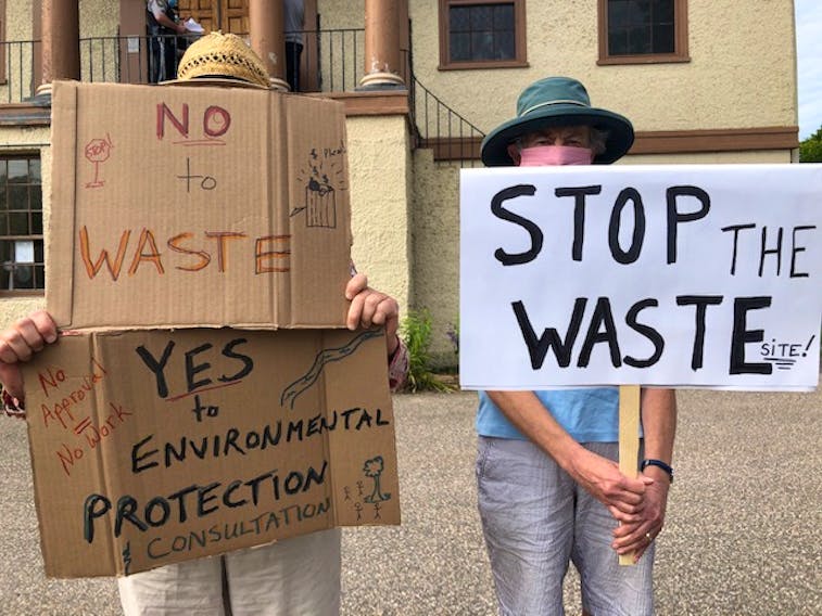 Two Annapolis County residents were waiting outside of the courthouse in Annapolis Royal on July 22 to express their opposition regarding the development and operation of a County of Annapolis waste transfer station along Highway 201 in West Paradise.