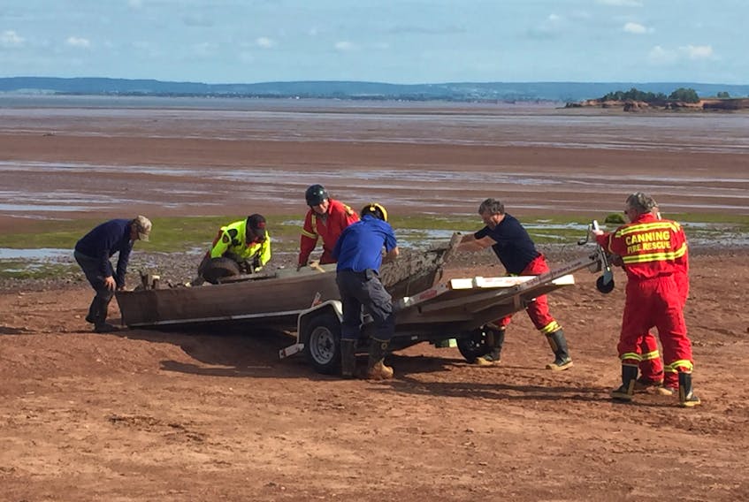 Firefighters with the Canning Fire Department helped rescue two people whose boat lost power along the along Blomidon peninsula July 15. They were brought ashore at Houston’s Beach.