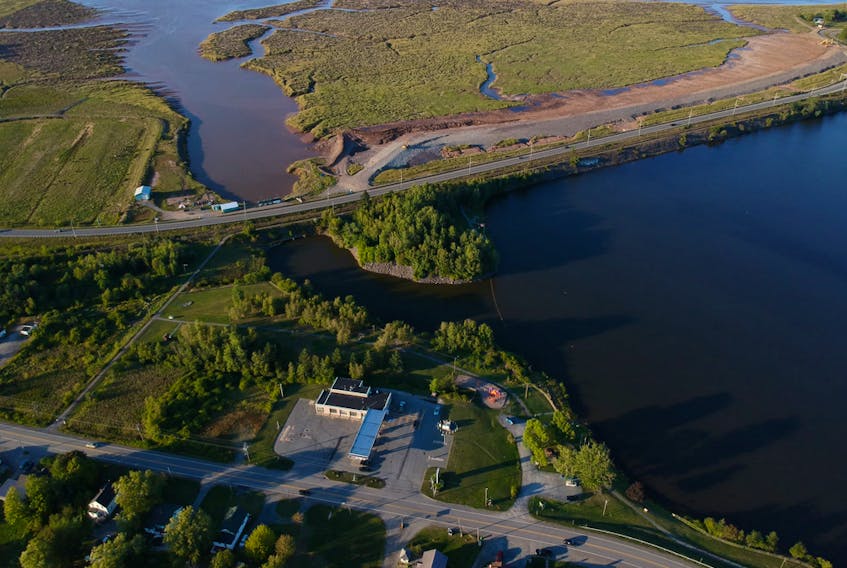 In order to accommodate the construction of the initial Highway 101, a causeway was installed between Windsor and Falmouth, cutting off the Avon River and creating Lake Pisiquid. — Photo courtesy of Alex Hanes