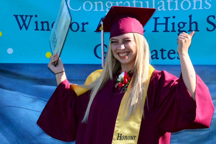 Victoria Henriksen was animated as she celebrated crossing the finish line — she graduated from the Windsor Adult High School with honours with distinction on June 24.