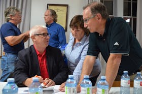 Residents speak with Annapolis County CAO John Ferguson, front left, and Warden Timothy Habinski, back right, at a public meeting Sept. 26 hosted by the county to make a presentation on a solid waste transfer site planned for West Paradise.