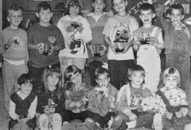 The Falmouth Pioneer Club was a fun spot for children to go every Wednesday evening in 1994. Pictured here are, from left, back row: Jeff Allen, Gregory Harnish, Shannon Muise, Matthew Miller, Mitchell Seary, Nicholas Rondhuis and Danny Hill; front row: Karen Richard, Danielle Crichton, Brittany Gaultoi, Christopher Allen, Christopher Dykens and Melisa Rondhuis.
