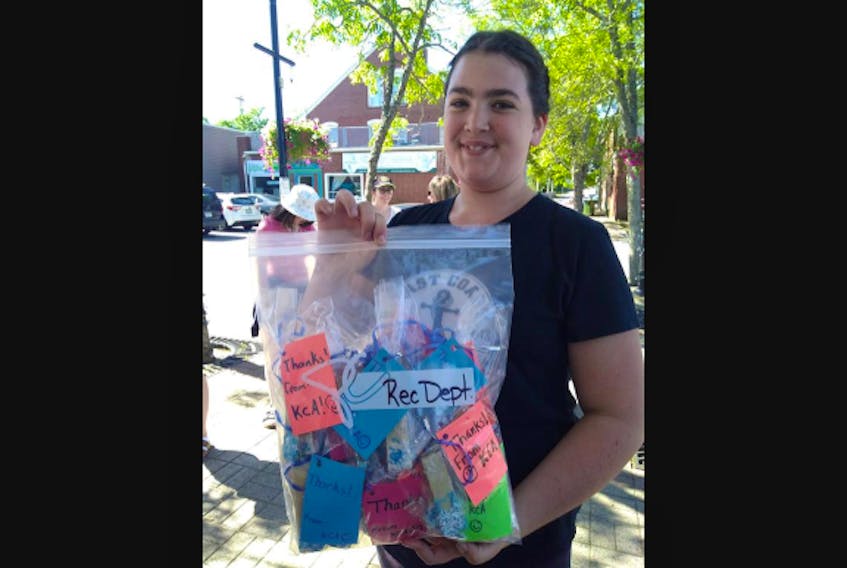 Grade 7 student Raina Gerrard was part of the group who made treats and then delivered them to service providers in Kentville, including the recreation department, Mayor Sandra Snow, the fire department and Emergency Health Services (EHS).