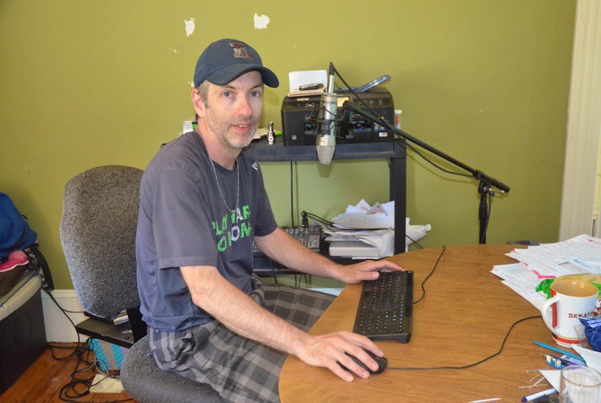 Kevin Brown, in his home office on Canaan Mountain. Brown is one of many residents of rural Kings County frustrated with the quality and reliability of their internet connection.