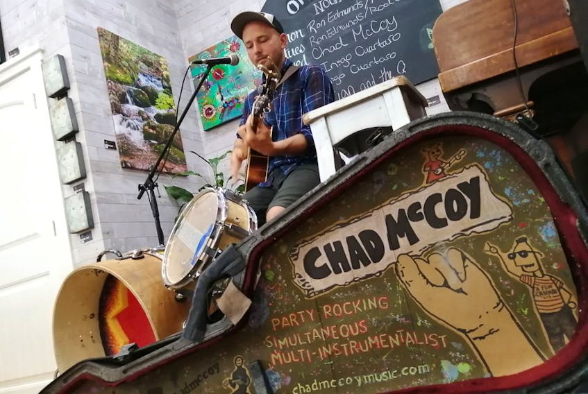 Dartmouth musician Chad McCoy performing at Edible Art in New Minas. McCoy recently completed a musical tour of Southern Nova Scotia entirely on his bike.