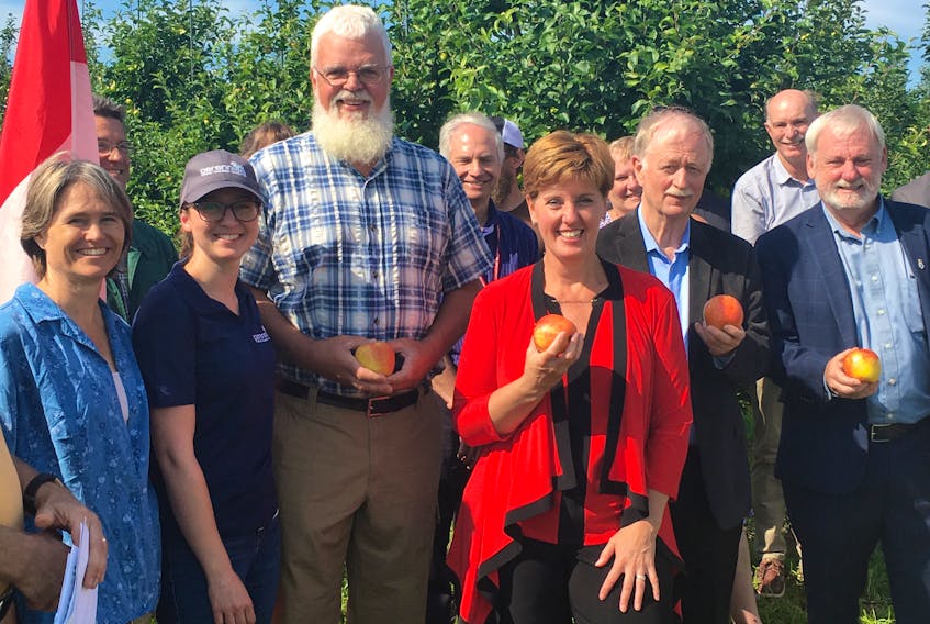 Representatives from the federal and provincial governments and staff at the Kentville Research and Development Center celebrated a significant funding announcement for research into the growing and storage of high-quality Nova Scotia apples.
