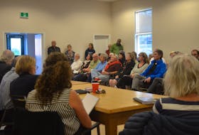 Wolfville residents filled the local fire hall to speak in opposition of a plan that would use the local RCMP space in town for community development offices.