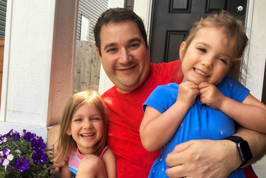 Adam Delorey with his daughters Charlotte and Emily. The Tracadie native, who had heart transplant surgery this past June, will be performing his stand-up comedy show at the Bauer Theatre, Sept. 26.