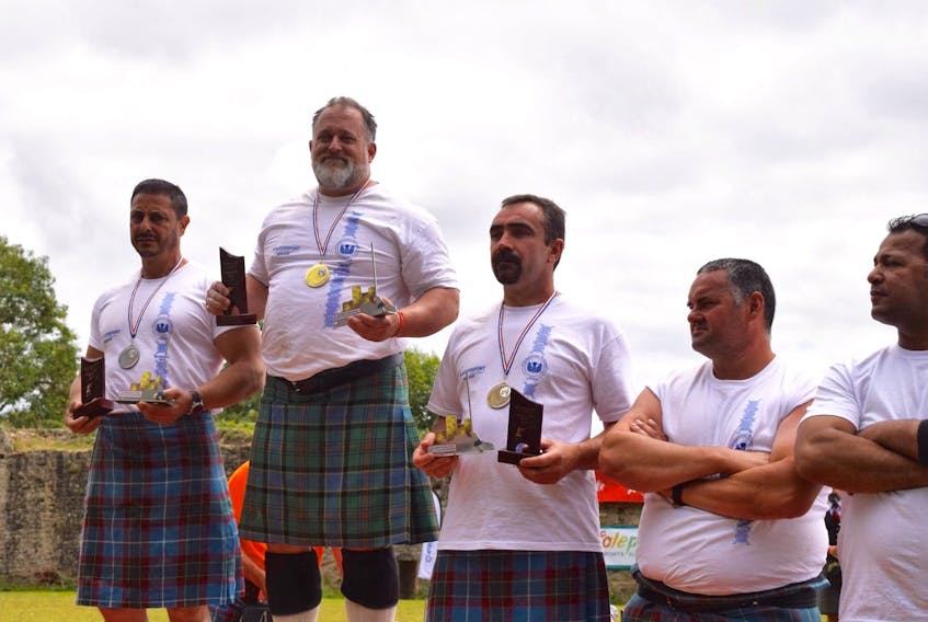 Adam Ogilvie, second from left, recently competed in the Highland Games Bressuire, in France. He won the French Master Championship, for those aged 40 and over.