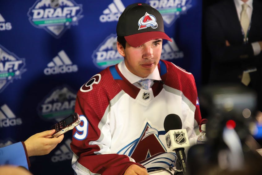 Minutes after being selected 16th overall by the Colorado Avalanche at Friday's NHL Entry Draft in Vancouver, Alex Newhook was busy telling his story to reporters. — Twitter/Colorado Avalanche