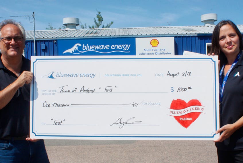 Bluewave Energy branch manager Greg Smith presents a cheque to Amherst’s culture, events and marketing coordinator Jennifer Bickerton in support for the first “A” Fest from Sept. 13 to 15. - Town of Amherst photo