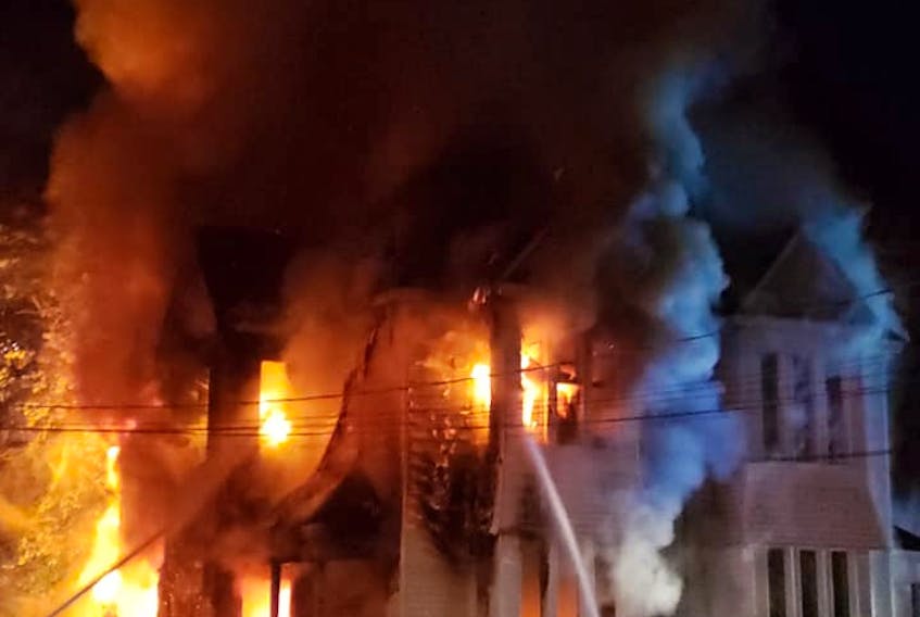 An early-morning fire engulfed a vacant, two-storey building near downtown Amherst early Wednesday morning. There were no injuries and the fire is under investigation. It was the second fire in 24 hours in Amherst, but fire chief Greg Jones said they are not connected. Mike Cooper photo