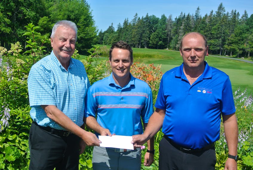 Bill Munro (left) of Archway Insurance and Ken Parrell (right) of Tantramar Chevrolet GMC Buick Ltd. present their sponsorships for the 2019 Amherst Open to club pro Michael Archibald. This year’s edition of the two-round golf tournament – the highlight of the Amherst Golf Club’s season – goes Aug. 21 and 22.