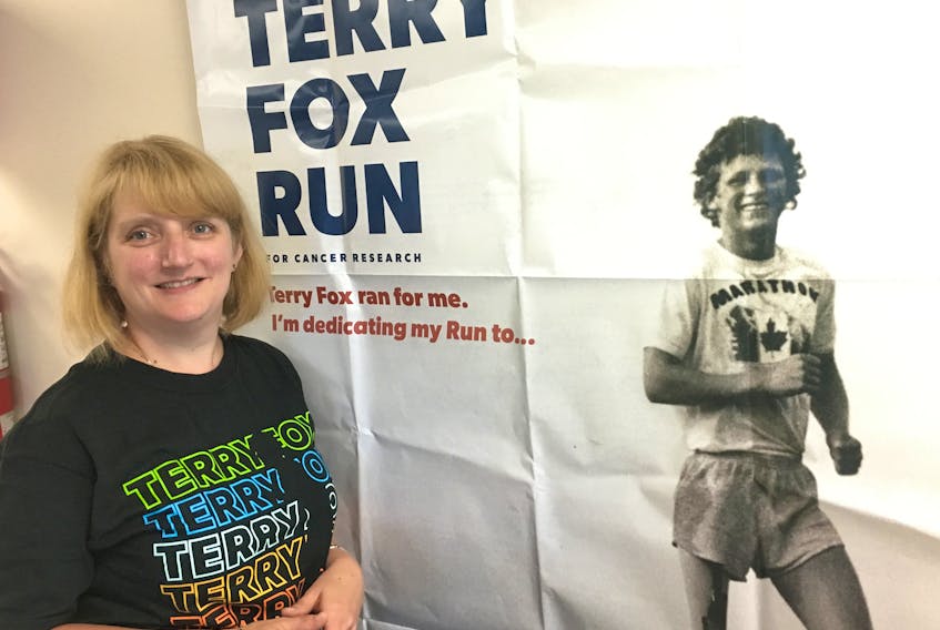 Monique Sullivan, organizer of the Amherst Terry Fox, looks over a post for the 39th event at Dickey Park on Sunday, Sept. 15 with registration at 9 a.m. and the run-walk beginning at 10 a.m.