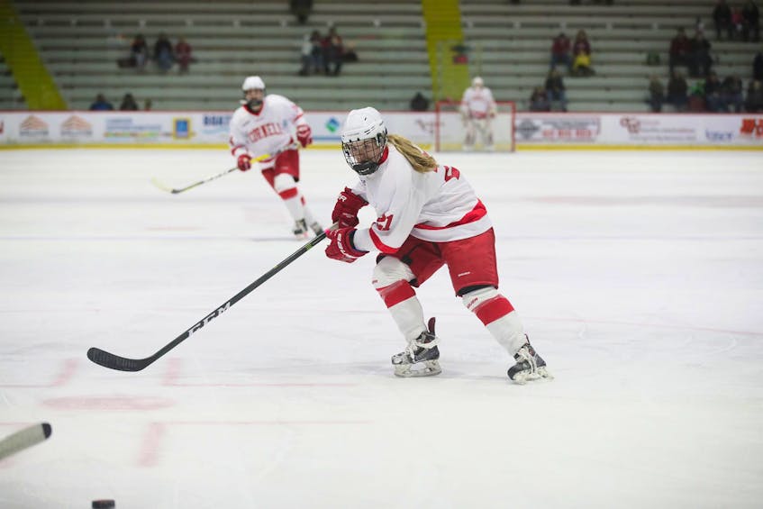 Amy Curlew, shown here playing NCAA hockey for Cornell Big Red, was drafted eighth overall by the NWHL's expansion Toronto squad. - Cornell University Athletics