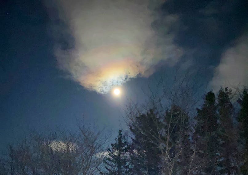 Many of us were out admiring the Full Pink Moon earlier this month. That’s what Beverley DeWolfe had planned when she stepped outside in Terrence Bay Nova Scotia. Then, she was treated to a partial lunar corona. Beverley is curious about the science behind the colours.