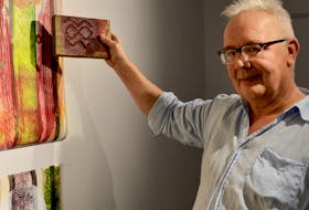 Artist Onni Norman is shown at a recent exhibition that featured some of his work. 
ELIZABETH PATTERSON/CAPE BRETON POST
