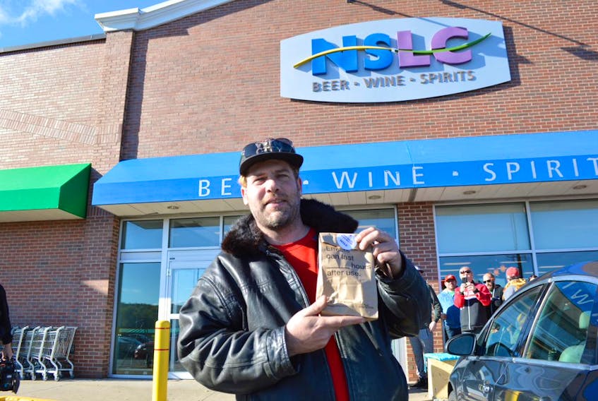 Renowned Cape Breton fiddler Ashley MacIsaac overnighted in the parking lot of the Sydney River NSLC store to ensure he was the first person on the island to purchase legal cannabis as shown in this file photo from Oct. 17, 2019. Sharon Montgomery - Cape Breton Post
