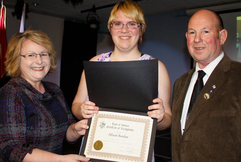 Allison Borden displays the certificate she received at the 2019 Athletic Achievers Award Ceremony on Feb. 12. Borden is a member of the Amherst Coyote soccer team, which won gold at the Nova Scotia Special Olympics Summer Games. On hand to present the certificates was Amherst deputy mayor Sheila Christie and Amherst town councillor Terry Rhindress.