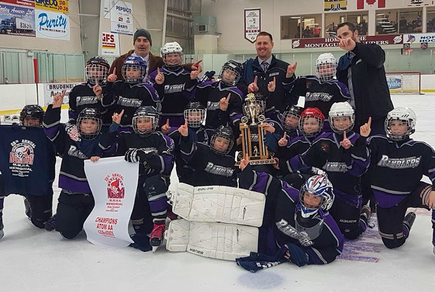 The Cumberland County Atom AA Ramblers defeated Pownal, P.E.I. 3-2 in double overtime to win the Atom AA championship at the Norseman Minor Hockey Tournament in Montague, P.E.I. on Jan. 13. Members of the team include: (front) Caleb Oulton, (second, from left) Evan Bird, Chaz Lockhart, Chase Livingston, Ethan Fraser, Jaxon Harrison, Owen Wood, Will Allen, Caiden Parris, Braydon Brown, Lucas Hurley, (third, from left) Brennan MacDonald, Sawyer Harvey, Austin Dickie, Mason Pyke, Connor Hunter, (back, from left) assistant coach Richard Harvey, head coach Jason Rhinas and assistant coach Matthew Lewis.