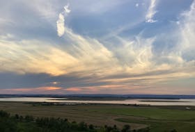 From Bruce and Doreen: “I hope you enjoy these pictures I took tonight (Thursday) at sunset!  I take lots of sunset photos but nothing quite like this.....do you see the face in the strange cloud formation? I live in Wolfville NS and we have a beautiful view of Cape Blomidon and blessed with beautiful sunrises and Sunsets!