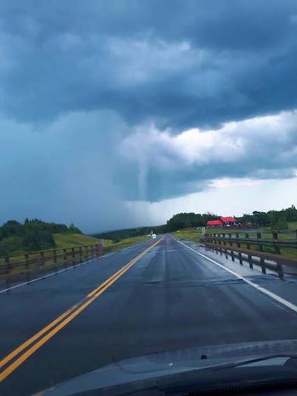 Wet roads ahead! Jody Collins snapped this photo of a rain shaft near St.Croix, Nova Scotia.