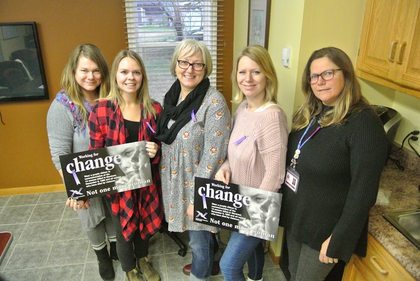 [From left] Jen Cormier, Heidi Simpson, Ruth Currie, Michelle Leblanc and Karen Yorke Gilbert are members of this year’s organizing committee for Amherst participation in the National Day of Remembrance and Action on Violence Against Women.