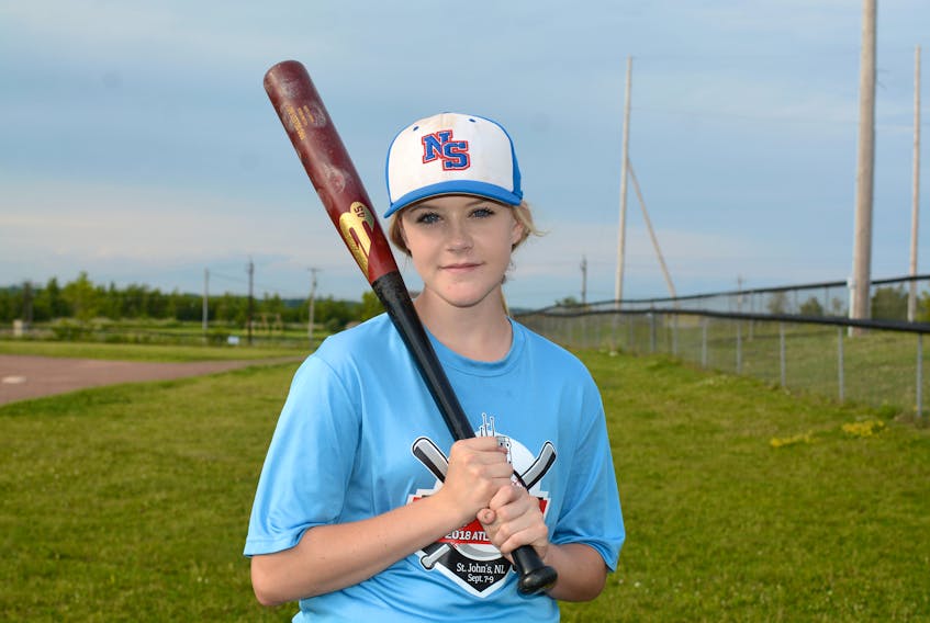 Springhill’s Avery Smith took a break from her baseball practice with the Amherst Athletics to discuss her trip to the Baseball For All National Baseball Tournament in Rockford, Illinois. The 14-year-old also plays for Team Nova Scotia, and she’s wearing a t-shirt from the 2018 U-14 Atlantic Championships she attended last year in St. John’s, Nfld.