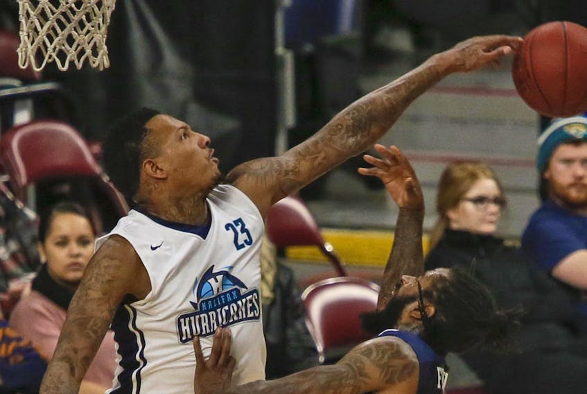 Billy White, then of the Halifax Hurricanes, rejects a shot from Saint John Riptide’s Gabe Freeman during NBL Canada action last January at the Scotiabank Centre. White, who was dealt to the Moncton Magic during the off-season, makes his return to Halifax as the Magic visit the Hurricanes in the 2018-19 season opener Thursday evening.