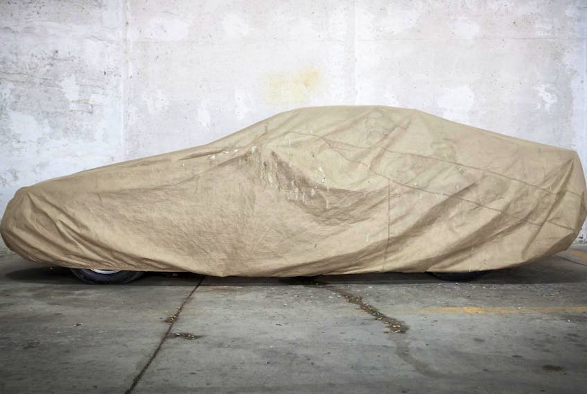 
you’ll cover your vehicle for the winter while it sleeps, be sure to use a quality car cover that’s intended for that purpose and never use a tarp, blanket, or any other sheet that’s not designed specifically as a car cover. - 123RF
