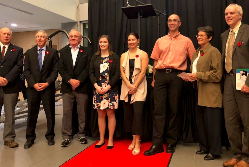 
The 2018 inductees to the Lunenburg County Sport Heritage Society (LCSHS) Wall of Fame at the Lunenburg County Lifestyle Centre (LCLC) in Bridgewater pose for a photo. From left: Georg Thomas (Tom) C. Ernst; Kevin Heisler; Brian Langley; Team Fay members Kristin Clarke, Karlee Burgess and coach Andrew Atherton; Diane Boulanger; and Scott Saunders. (Contributed)
