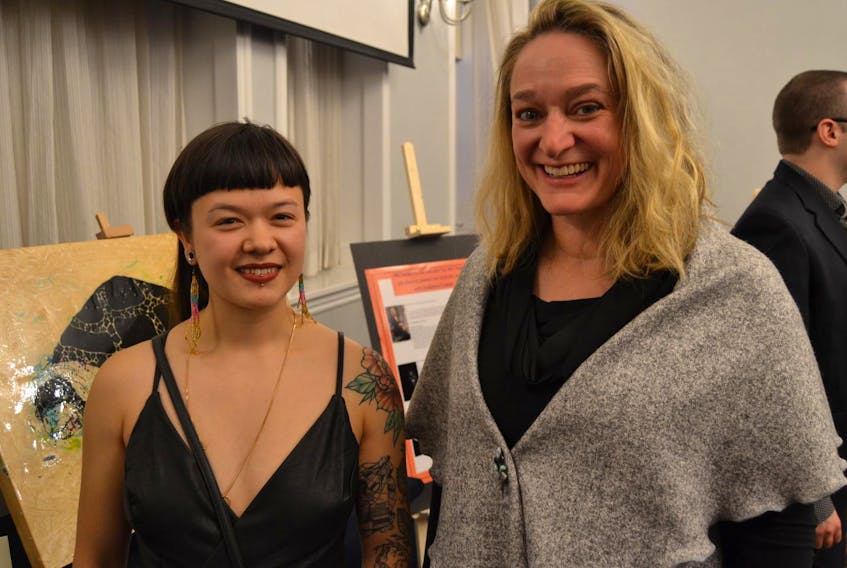 
The JRG Society for the Arts awarded its first grant to Toronto-based artist Wy Joung Kou (left), seen here with society founder Rachel Bower. (Chris Muise)
