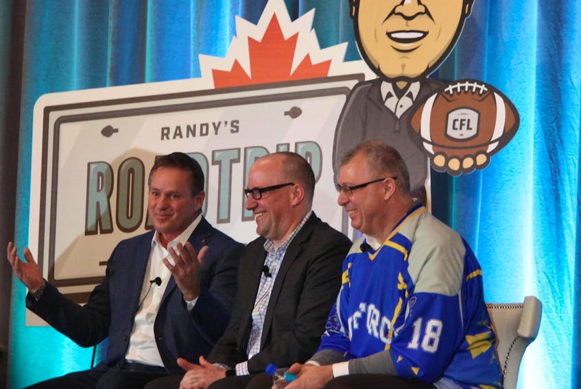 Anthony LeBlanc, centre, is shown with Maritime Football Ltd. partner Bruce Bowser, left, and CFL commissioner Randy Ambrosie during a town hall event in Halifax on Feb. 23. Maritime Football wants to bring a CFL team to Halifax.
