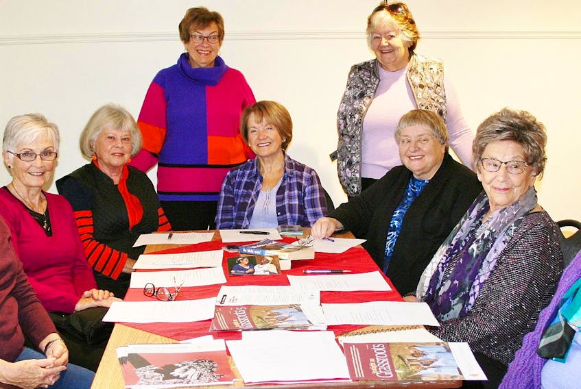
Around the table are members of the Bedford Grandmothers to Grandmothers Campaign (G2G) group meeting at Scott Manor House. From left: Corinne MacDonald, Julie Irwin, Joan Johnston, Brideen Morgan, Penny St-Amand, Barbara Haysom and Diana Haydon with Marilyn Sceles and Barb Macey standing. (Sheryl Dubois)
