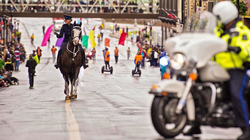 
A Halifax Regional Police mounted member and horse march on Barrington Street during the Halifax Pride Parade in 2015. - File

