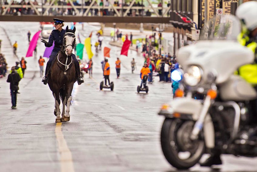 
A Halifax Regional Police mounted member and horse march on Barrington Street during the Halifax Pride Parade in 2015. - File
