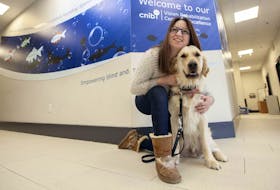 
Alycia Pottie and Piper, her new guide dog, are now a team. After over a year of training for Piper, and three weeks of training for Alycia, the duo are now going home. - Eric Wynne
