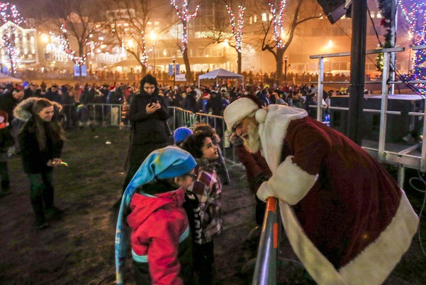 
Santa speaks to a few children over the barricade at Grand Parade after the annual Christmas Tree Lighting celebration in Halifax last month. (FILE)
