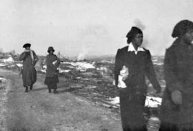
Four women walk through their devastated community of Africville after the Halifax Explosion on Dec. 6, 1917. The experiences of African-Nova Scotians around the time of the Halifax Explosion on Dec. 6, 1917, is part of a storytelling performance called Black Explosion on Friday, Dec. 14, at 7:30 p.m. at the Black Cultural Centre. - City of Toronto Archives
