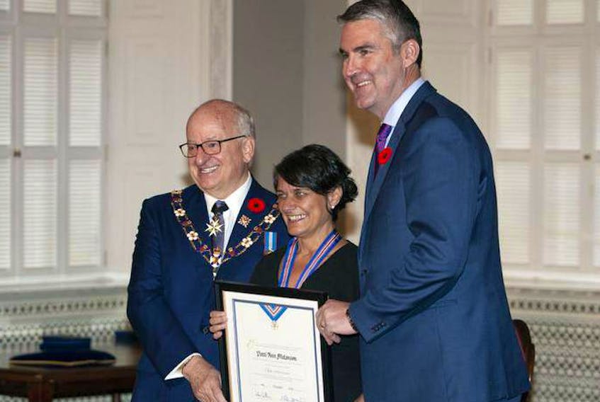 
Patti Melanson, a nurse and homeless and vulnerable persons advocate, receives the Order of Nova Scotia during a ceremony at Province House last month. With her is Nova Scotia Lt.-Gov. Arthur J. LeBlanc, left, and Premier Stephen McNeil. - Eric Wynne
