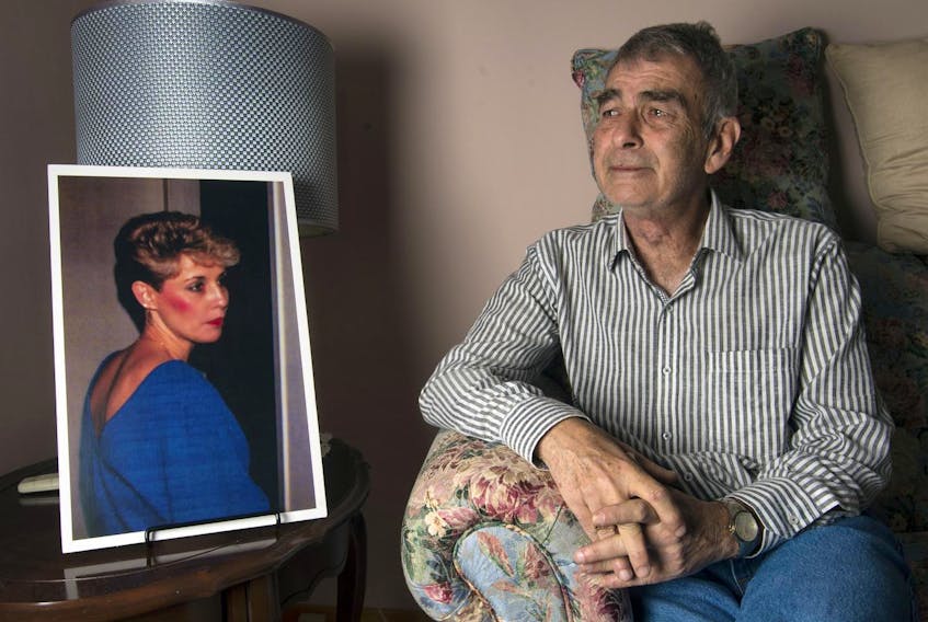 
Jim Burke sits next to a photo of his wife Joanne at his Dartmouth home on Friday morning. Joanne died last month at the age of 63. - Ryan Taplin - The Chronicle Herald
