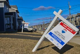 
A real estate sign stands in front of a home in the Governor’s Brook subdivision in Spryfield on Thursday. The monthly housing price gap between Halifax and the national average of 11 cities has grown to over $100,000. - Tim Krochak
