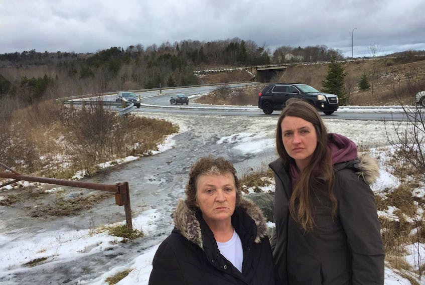
Sackville Manor Mobile Home Park residents Diane Bernard, left, and Holly Gallant are hoping the province or Halifax Regional Municipality will do something to make Beaver Bank Connector safer for them and other pedestrians of the park that walk the dangerous artery daily. In November a trailer park resident was killed trying to cross the connector. - Andrew Rankin
