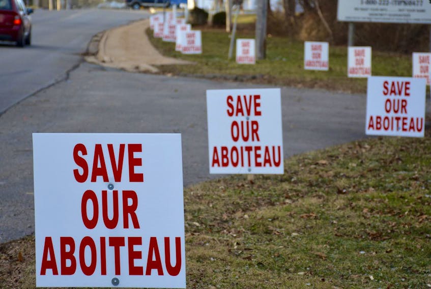 
Signs line the entrance to Hantsport, and were installed by members of the Aboiteau Action Committee. - Colin Chisholm
