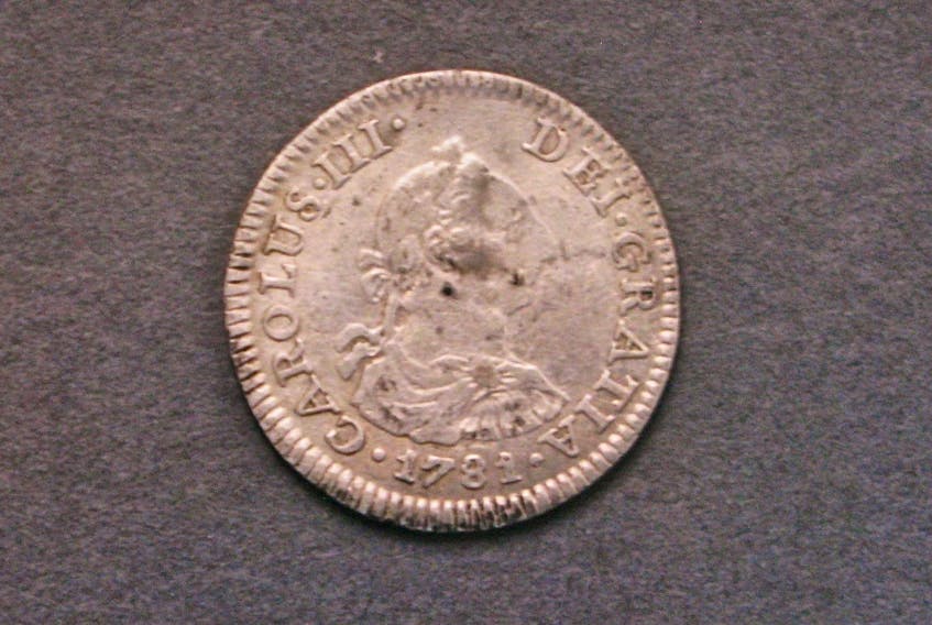
A 1781 silver 1/2-real coin, minted In Mexico, , one of many artifacts found on Oak Island’s lot five and documented on robert Young’s website. - Robert Young 
