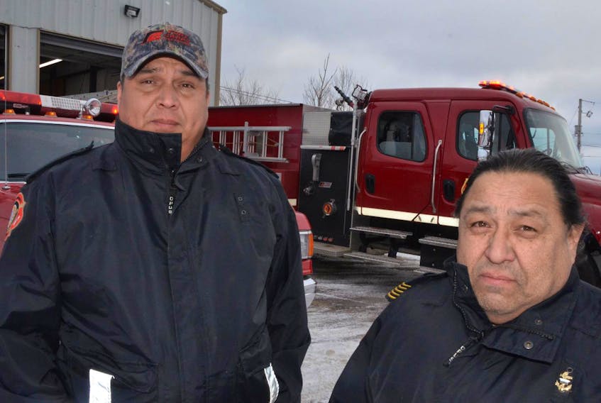 Capt. Wilfred Gould Jr. and Chief John Cremo of the We’koqma’q Volunteer Fire Department. 

