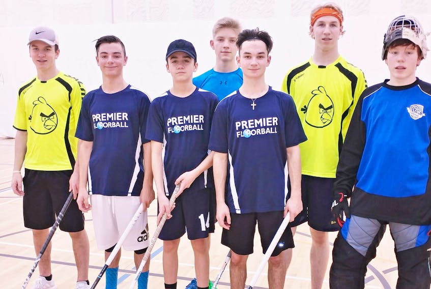 
From left: Ryder Tolson, Noah Morgan, Sam Casey, Nikolas Koch, Ethan Morgan, Brendan McQuaid and Cameron Hale break from a regular Halifax Floorball League pickup game at the Bedford Hammond Plains Community Centre. More floorball action is coming to HRM this spring with the Men’s U19 World Floorball Championships in May. - Anthony Mac Neil
