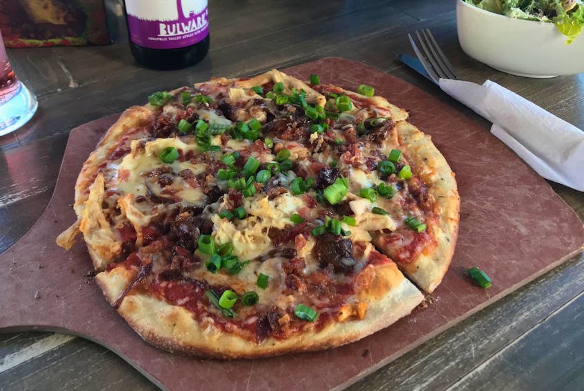 
The pizza at Piez Bistro had a thin, well done crust with a slight crunch on the bottom, and soft chew on top, and the Caesar salad, coated in thick creamy dressing brimming with heady notes of lemon and garlic, was first rate. - Kelly Neil
