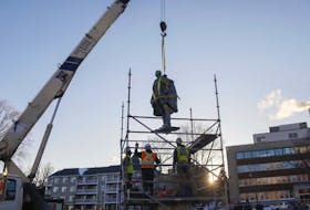 
The statue of Edward Cornwallis is lifted from its base last January in the Halifax park that still bears his name. - Tim Krochak
